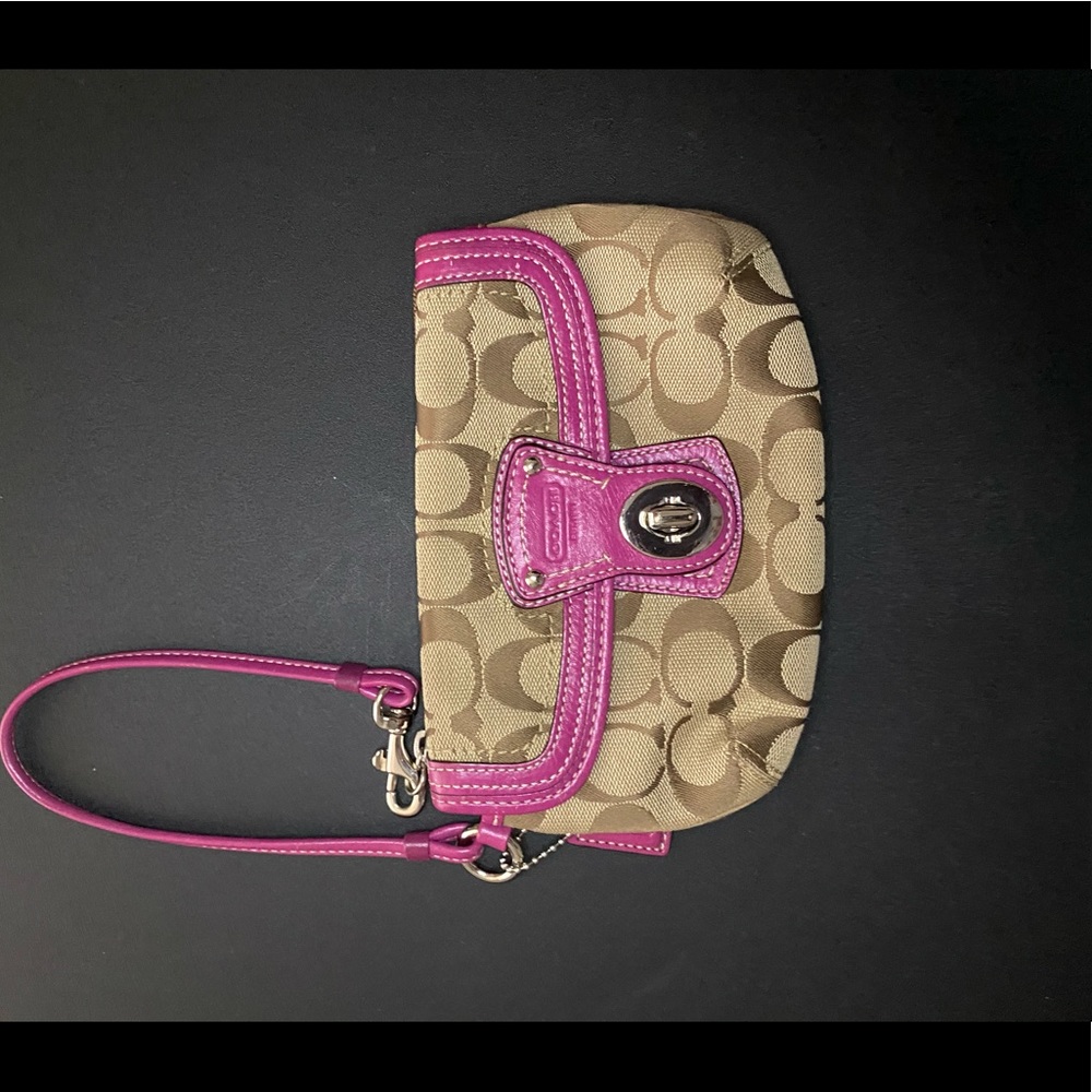 Coach Signature wristlet with buckle
